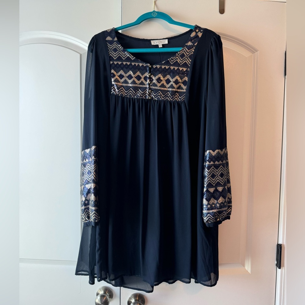 Flowy blue dress with gold and blue sequins on chest and sleeves